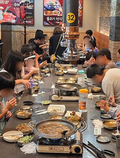 금촌1동 발전협의회, 지역아동센터 아동에 점심 후원 및 학용품 전달 기사 이미지